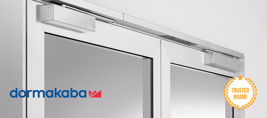 dormakaba door closer on top of glass door